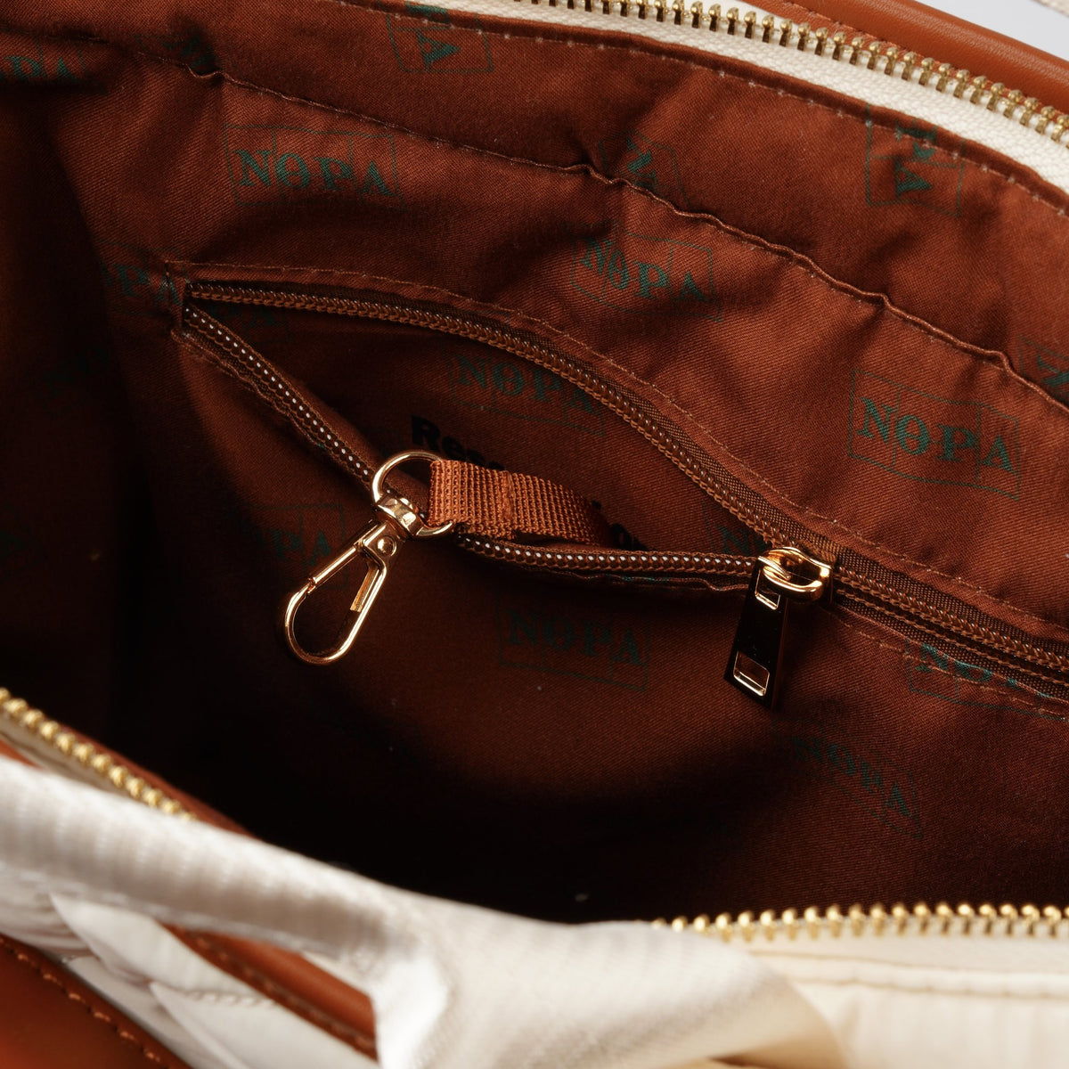 NOPA cream padel racket bag, alternate front angle view