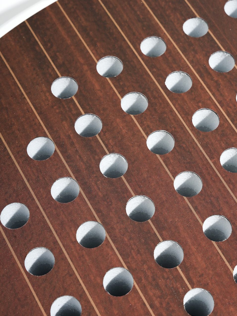 NOPA Vintage Mahogany padel racket closeup